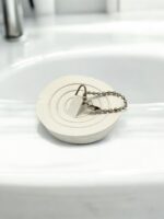 Пробка в умивальник з ланцюжком d 5,3 см