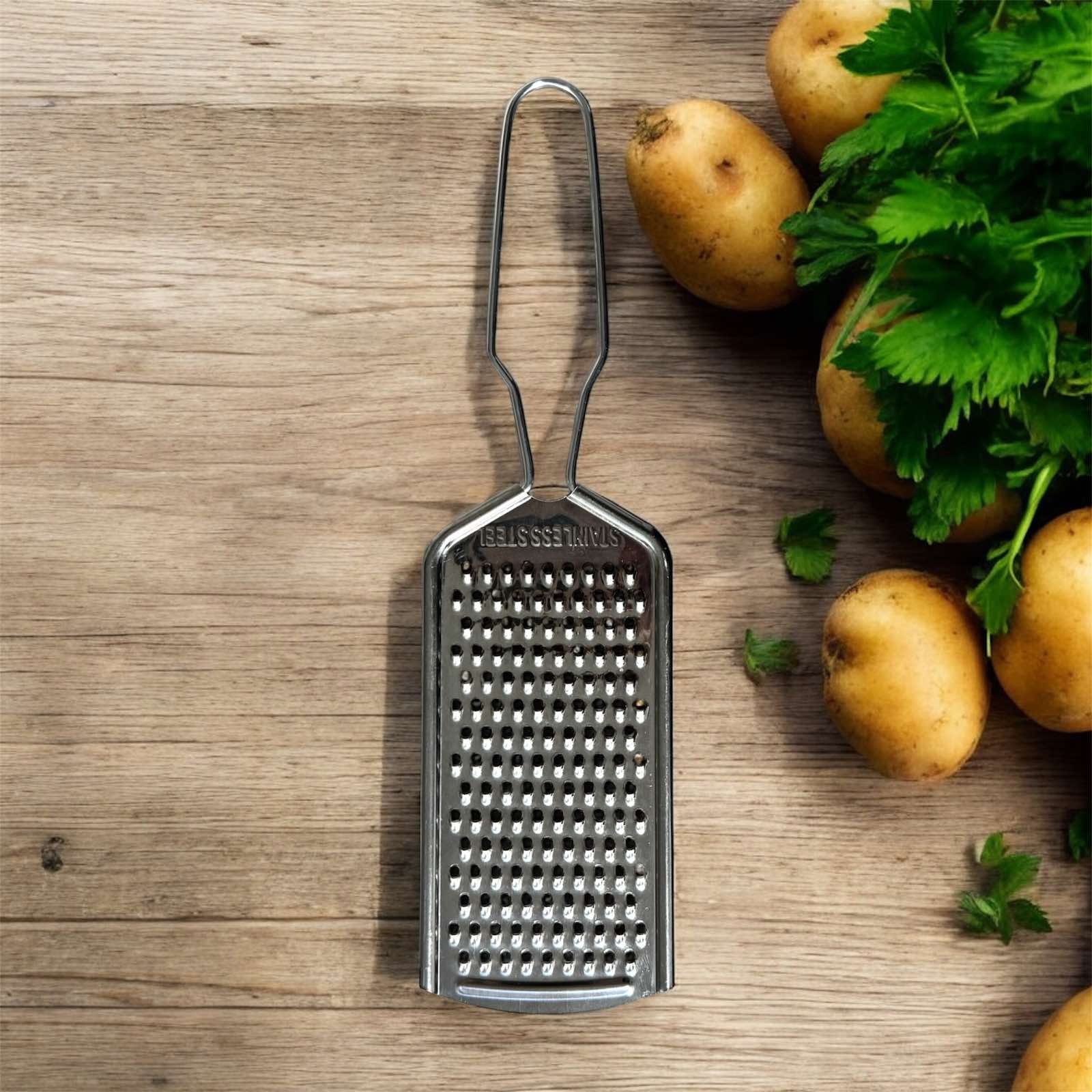 зображення_viber_2025-12-17_16-40-31-348 67345 Тертка з ручкою нерж деруни - Зображення 1
